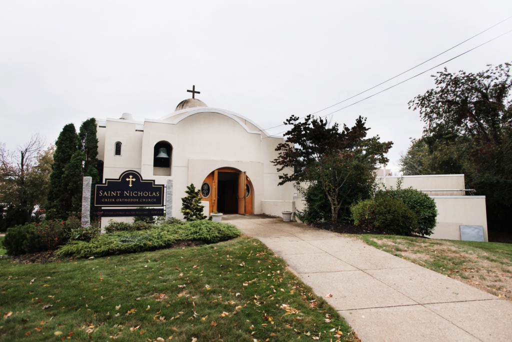 A Maine wedding with a ceremony at St Nicolas Greek Orthodox Church in Portsmouth New Hampshire