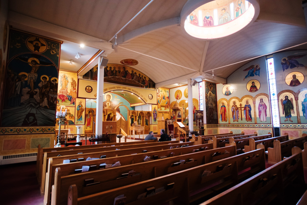 A Maine wedding with a ceremony at St Nicolas Greek Orthodox Church in Portsmouth New Hampshire