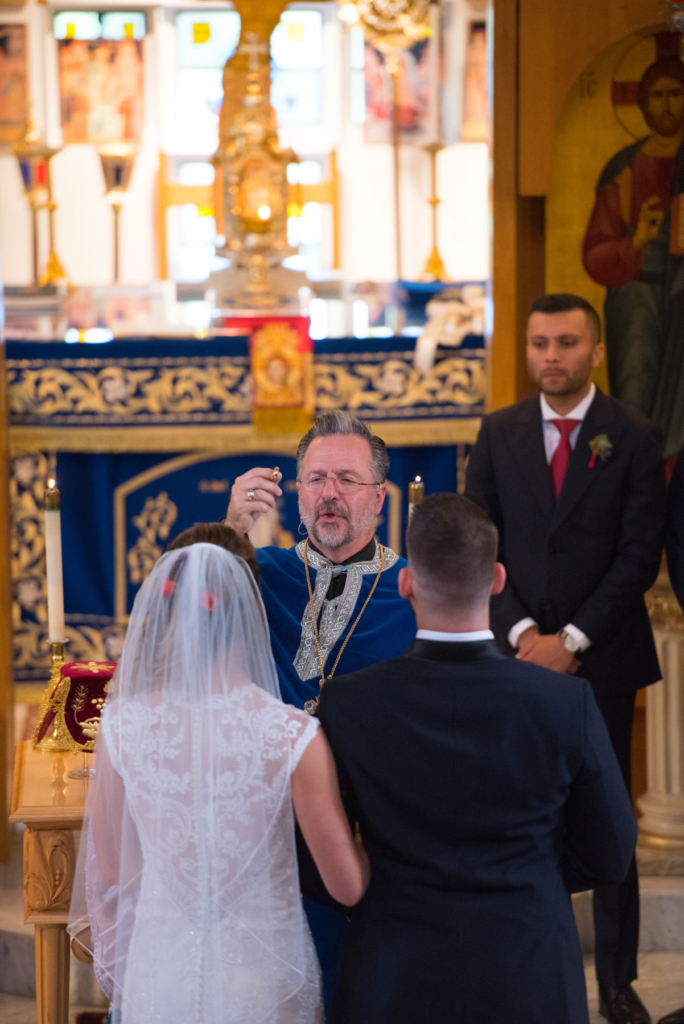 A Maine wedding with a ceremony at St Nicolas Greek Orthodox Church in Portsmouth New Hampshire