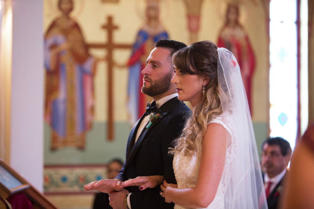 A Maine wedding with a ceremony at St Nicolas Greek Orthodox Church in Portsmouth New Hampshire