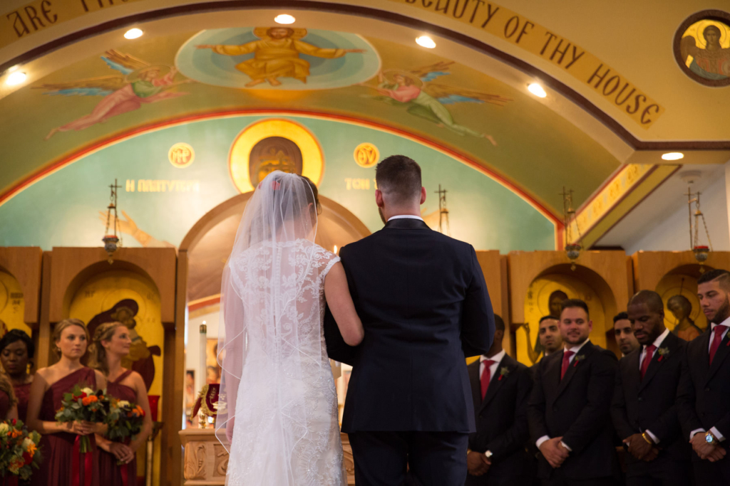 A Maine wedding with a ceremony at St Nicolas Greek Orthodox Church in Portsmouth New Hampshire