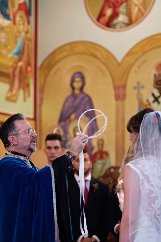 A Maine wedding with a ceremony at St Nicolas Greek Orthodox Church in Portsmouth New Hampshire