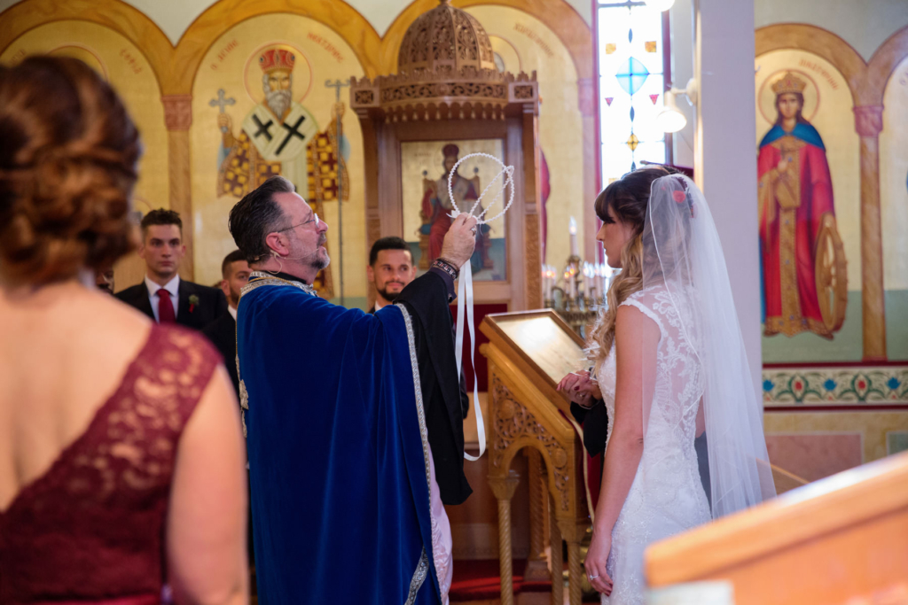 A Maine wedding with a ceremony at St Nicolas Greek Orthodox Church in Portsmouth New Hampshire