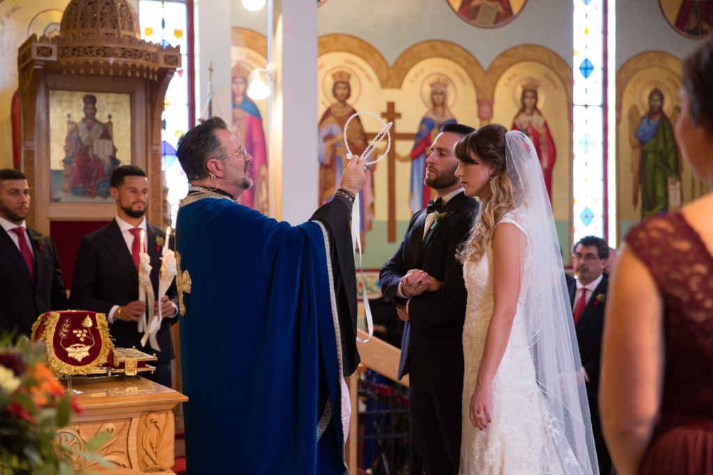 A Maine wedding with a ceremony at St Nicolas Greek Orthodox Church in Portsmouth New Hampshire