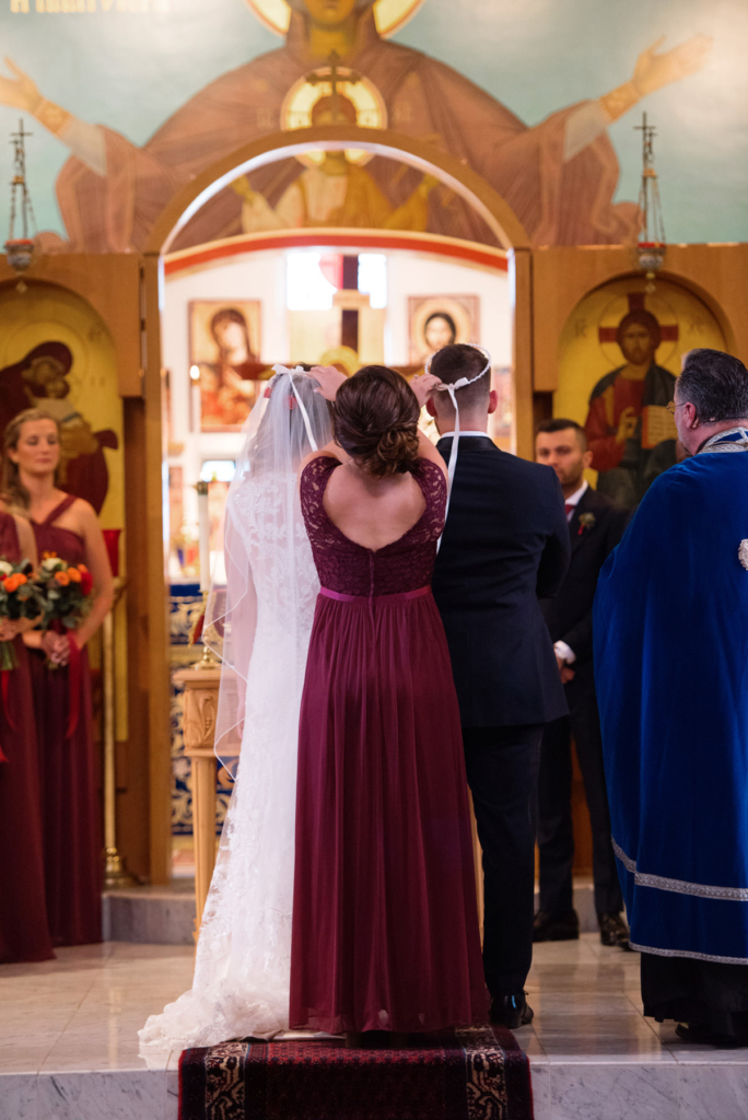 A Maine wedding with a ceremony at St Nicolas Greek Orthodox Church in Portsmouth New Hampshire