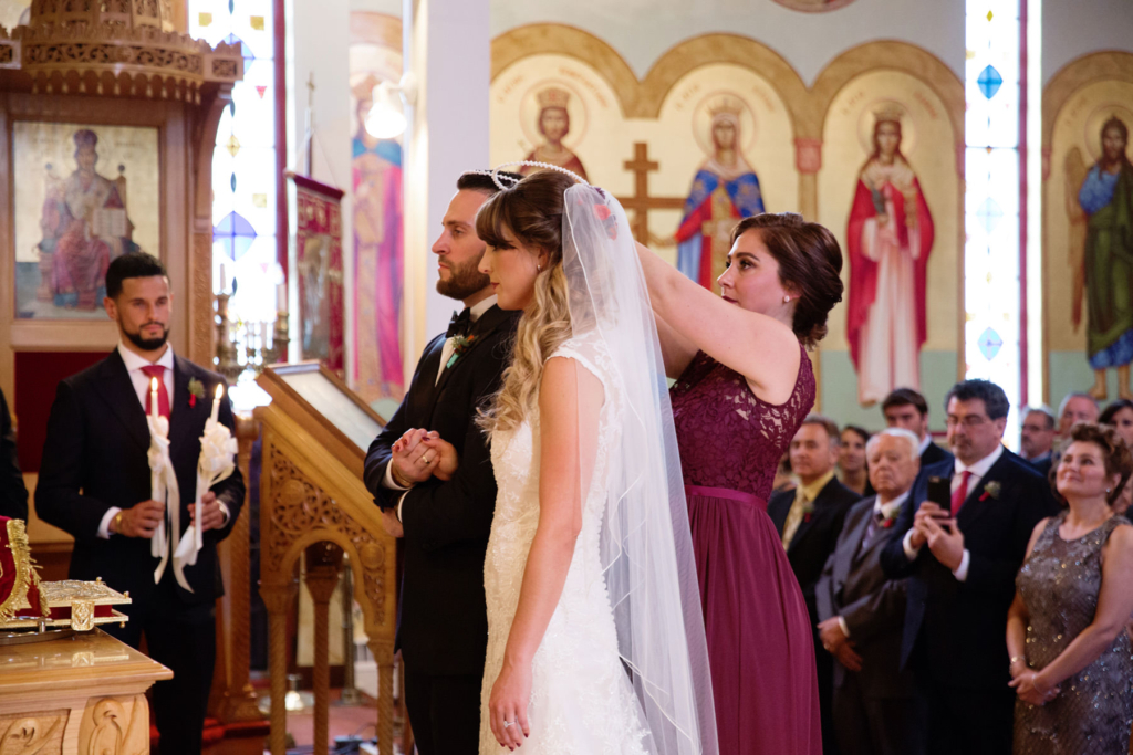 A Maine wedding with a ceremony at St Nicolas Greek Orthodox Church in Portsmouth New Hampshire