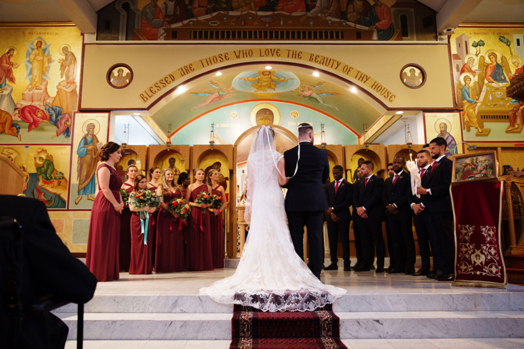 A Maine wedding with a ceremony at St Nicolas Greek Orthodox Church in Portsmouth New Hampshire