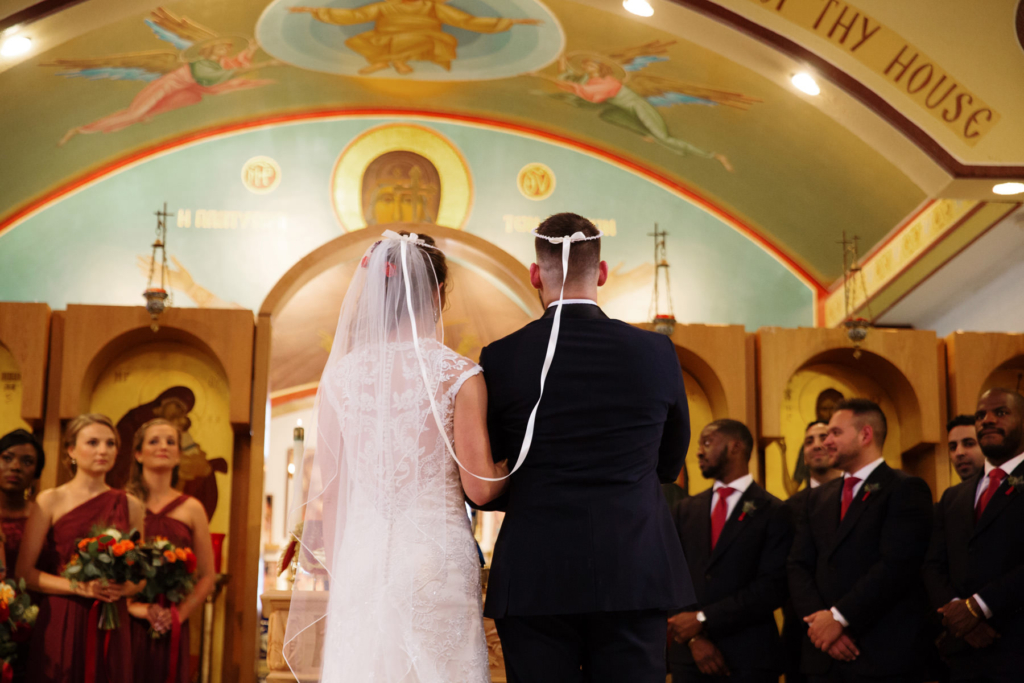 A Maine wedding with a ceremony at St Nicolas Greek Orthodox Church in Portsmouth New Hampshire