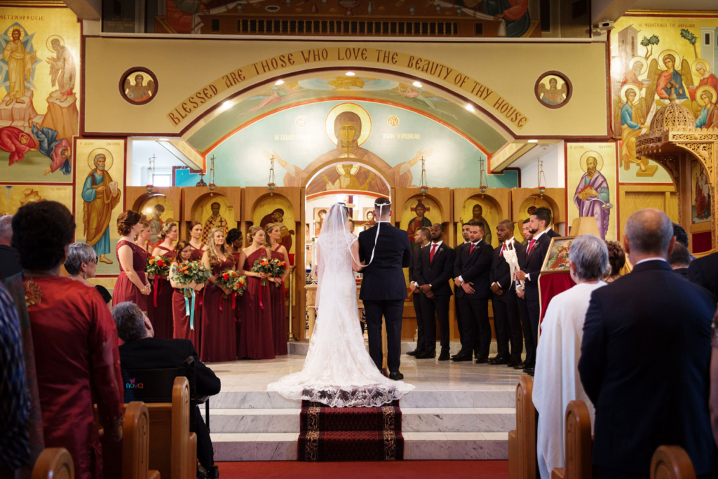 A Maine wedding with a ceremony at St Nicolas Greek Orthodox Church in Portsmouth New Hampshire