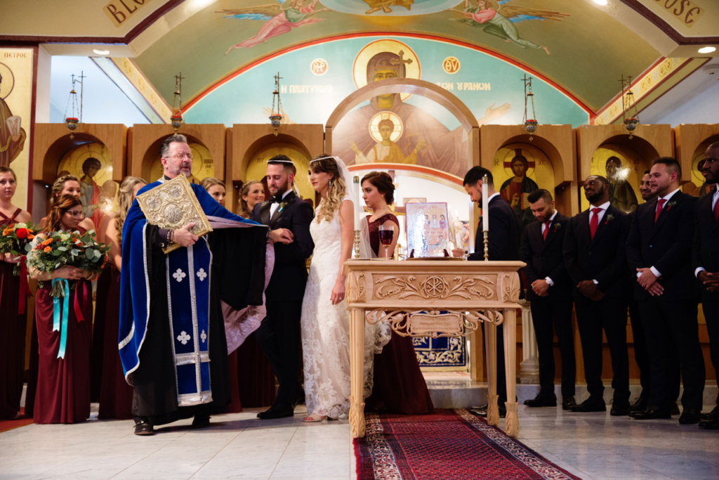 A Maine wedding with a ceremony at St Nicolas Greek Orthodox Church in Portsmouth New Hampshire