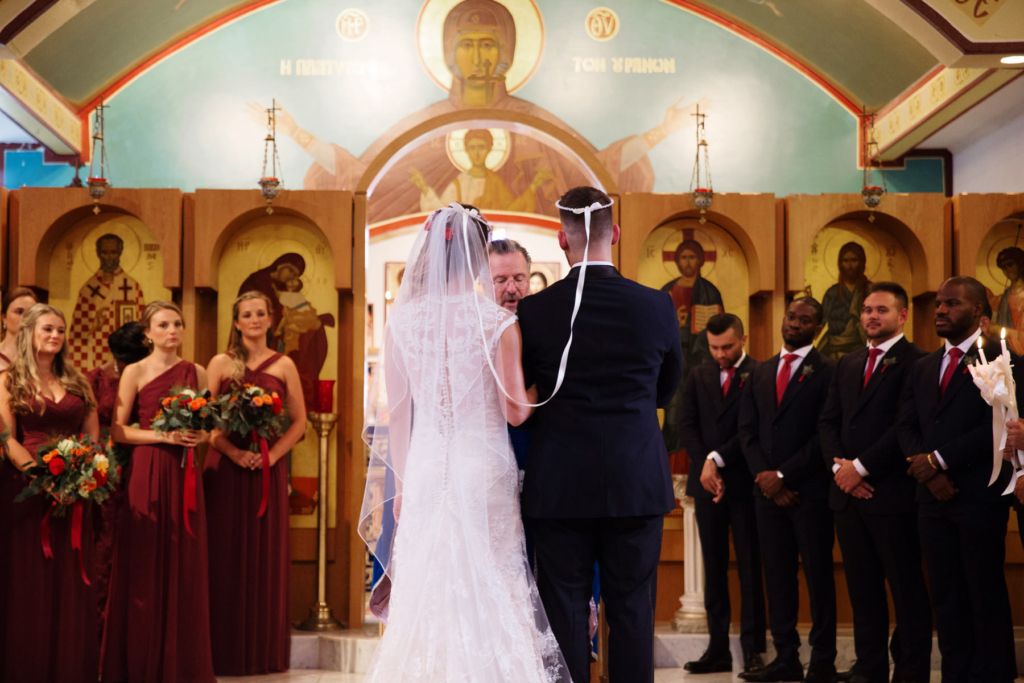 A Maine wedding with a ceremony at St Nicolas Greek Orthodox Church in Portsmouth New Hampshire