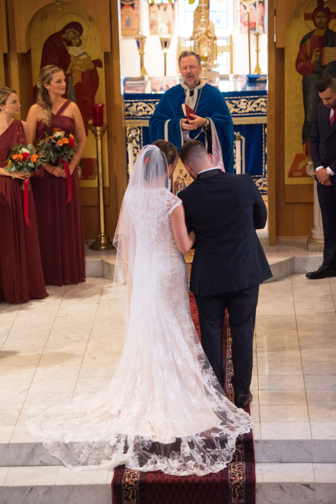 A Maine wedding with a ceremony at St Nicolas Greek Orthodox Church in Portsmouth New Hampshire