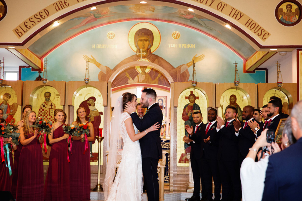 A Maine wedding with a ceremony at St Nicolas Greek Orthodox Church in Portsmouth New Hampshire