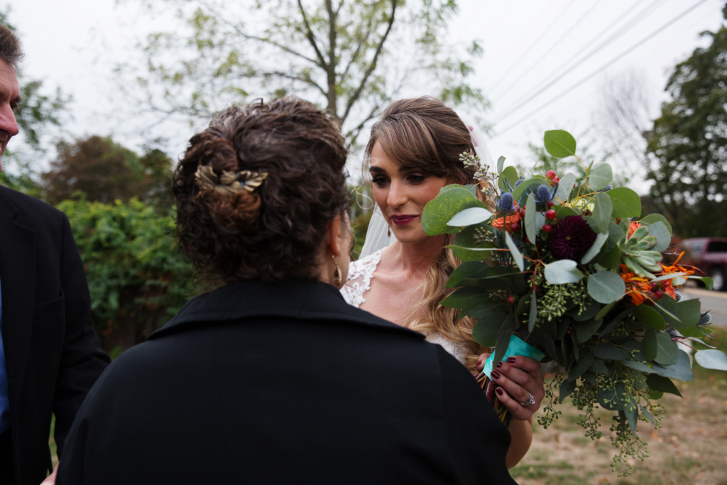 A Maine wedding with a ceremony at St Nicolas Greek Orthodox Church in Portsmouth New Hampshire