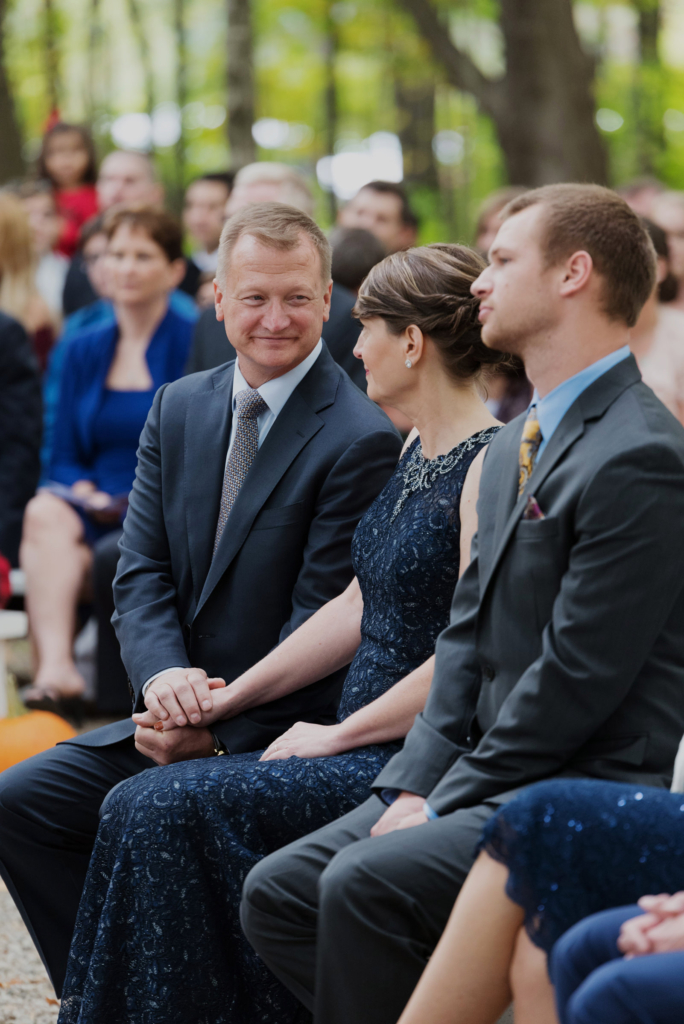 The bride's mom and dad during a ceremony at The Barn on Walnut Hill