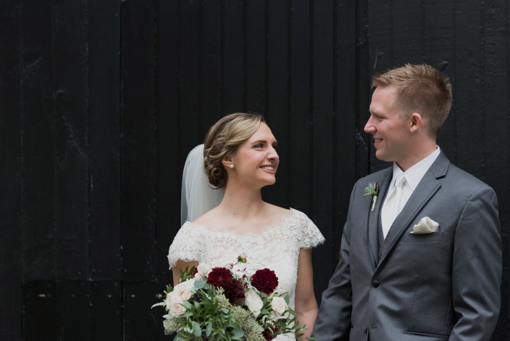 In front of The Barn on Walnut Hill on their wedding day