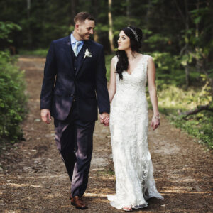 Chelsea and Bill taking a quiet walk just after their ceremony at a Sebasco Harbor Resort Wedding.